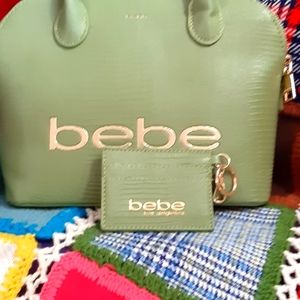 bebe med. Light green purse only carried 1 time